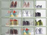 a picture of a shoe rack with many pairs of shoes in it