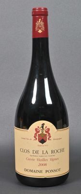 a bottle of wine that is sitting on a table