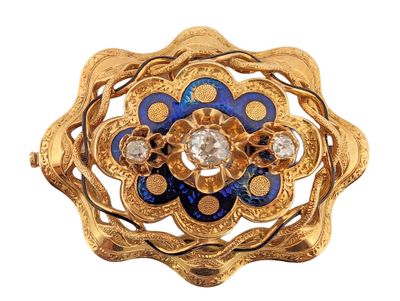an image of a gold and blue flower broochle with diamonds