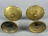 pair of antique brass candlesticks with flower decoration