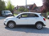 a picture of a white car parked in a parking lot