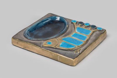 an image of a blue and gold ashtray