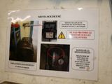 a sign on the wall telling people not to use the machine