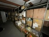 many boxes on the shelves in the room