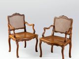pair of antique chairs with cane back and cane arms