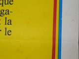 a yellow book with black writing on it