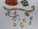 a lot of jewelry that is laying out on the table