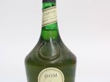 a bottle of wine that is sitting on a table
