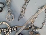 many different types of jewelry on the table