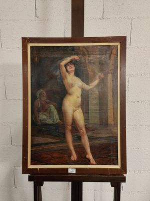 une image représentant un tableau représentant une femme nue sur un chevalet