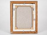 an old wooden picture frame with a picture of a dog