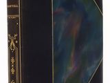 a black book with gold trimming and a black cover