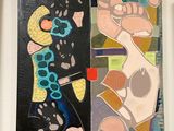 two paintings hanging on the wall next to each other