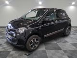 a picture of a small black car parked on a checkered floor