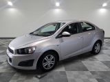 a picture of a silver car parked in a showroom