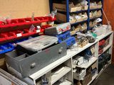 a room with a lot of items on the shelves