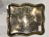 a silver tray that is sitting on a table