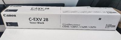 deux boîtes de cartouches de toner noir Canon C-EXV28 posées sur une table