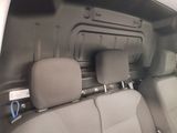 the back seats of a car with the back of the seat folded down