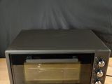 an image of a toaster oven sitting on a table