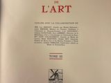 an open book with a picture of a windmill on it