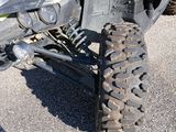 a close up of a motorcycle with a tire on the ground