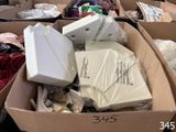 many boxes of items that are sitting on the ground