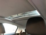 a view of the sunroof from the inside of a car