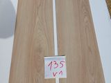 a close up of a piece of wood with a price tag on it
