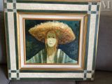 un tableau représentant une femme portant un chapeau de paille, assise sur un canapé