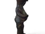 an image of a statue of a woman with her hands in her pockets