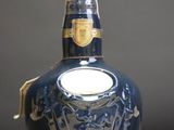 a bottle of liquor that is sitting on a table