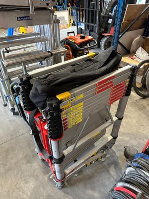 a cart with a lot of tools on it in a garage