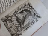 a person holding a book with a picture on it