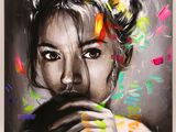 un tableau représentant une femme avec des fleurs dans les cheveux