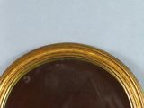 a mirror that is sitting on a table
