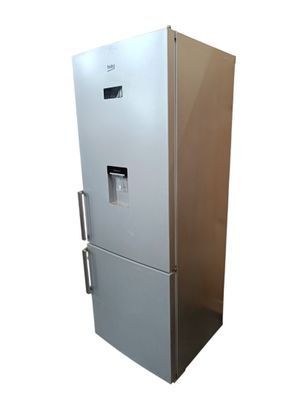 a silver refrigerator that is on display against a white background