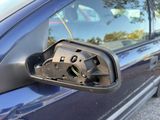 a close up of a car ' s side view mirror