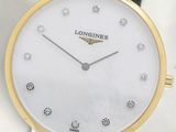 an image of a close up of a wrist watch with diamonds on it