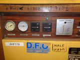 a machine that has a lot of different gauges on it