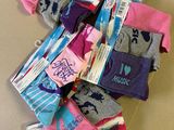 a pile of socks that are on a table