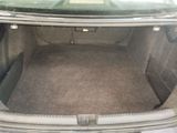 a trunk of a car with the back seat folded down