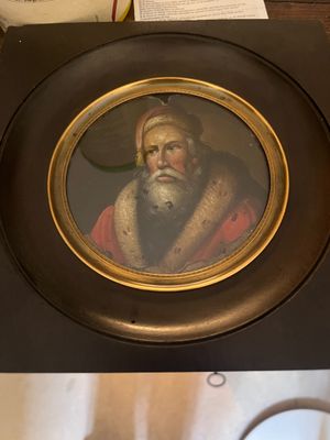 a picture of a man with a beard and a beard in a picture frame