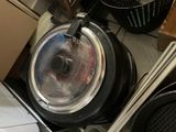 an image of a kitchen that has a lot of pots and pans in it