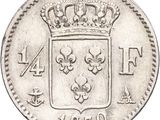 a close up of a coin with a crown on top of it