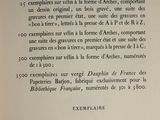 a close up of an open book with a black and white image