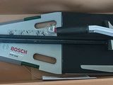 a cardboard box with a pair of scissors in it