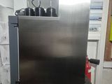 an image of a stainless steel refrigerator in a kitchen
