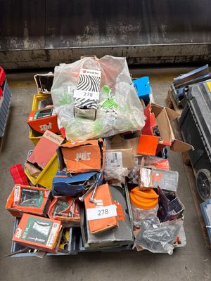 a pile of assorted items sitting on the ground