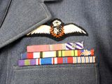 a military uniform with a military eagle on the back of it